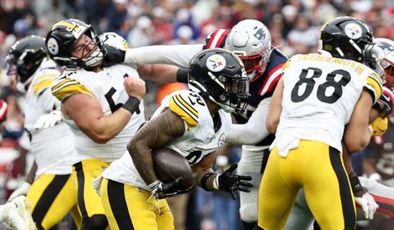 T.J. Watt of the Pittsburgh Steelers runs the ball during the second half of the game against the New England Patriots at Gillette Stadium on Sept. 20, 2026, in Foxborough, Massachusetts.