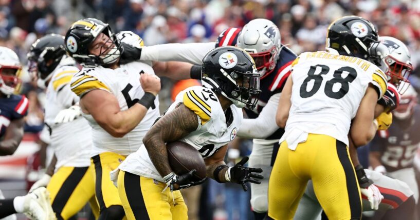 T.J. Watt of the Pittsburgh Steelers runs the ball during the second half of the game against the New England Patriots at Gillette Stadium on Sept. 20, 2026, in Foxborough, Massachusetts.