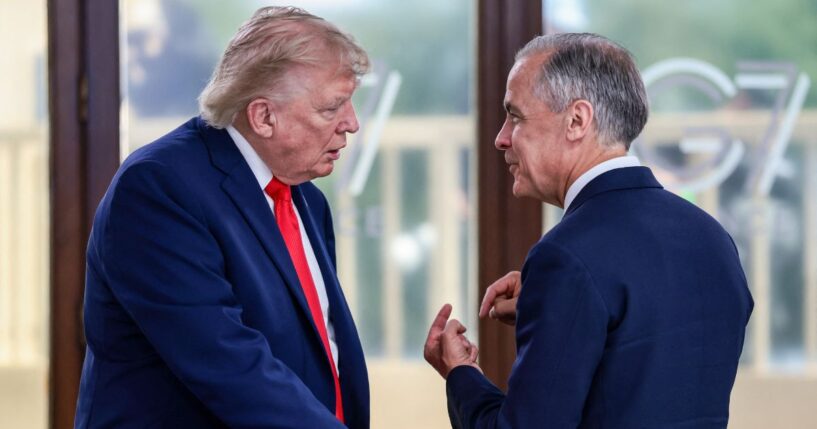 President Donald Trump speaks with Canadian Prime Minister Mark Carney during a work lunch as part of the G7 summit, in Evian, eastern France, on June 16, 2026.