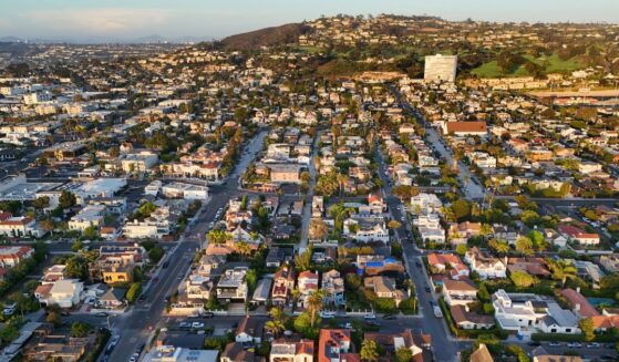 In an aerial view, luxury single-family homes and residential neighborhoods are seen along the coastal community of La Jolla on Aug. 28, 2026, in San Diego, California.