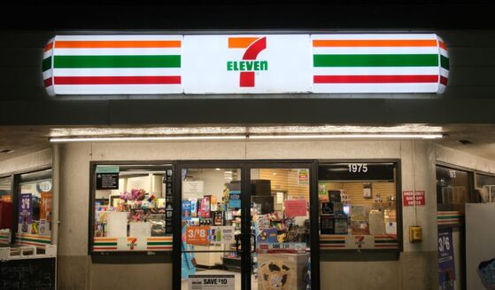 A 7-Eleven convenience store facade at night in Merced, California, on June 10, 2024.