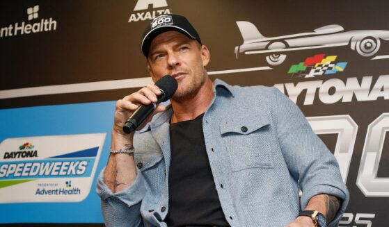 Alan Ritchson speaks to the media during a press conference prior to the NASCAR Cup Series Daytona 500 at Daytona International Speedway on Feb. 16, 2025, in Daytona Beach, Florida.