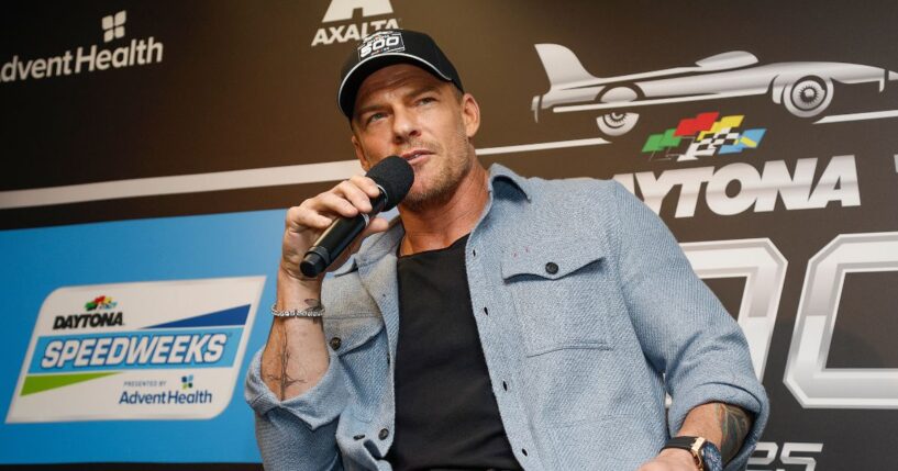 Alan Ritchson speaks to the media during a press conference prior to the NASCAR Cup Series Daytona 500 at Daytona International Speedway on Feb. 16, 2025, in Daytona Beach, Florida.