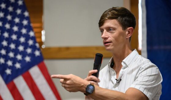 Iowa gubernatorial candidate Rob Sand speaks to voters during a campaign visit to the Carroll County Conservation Classroom on Aug. 20, 2026, in Carroll, Iowa.