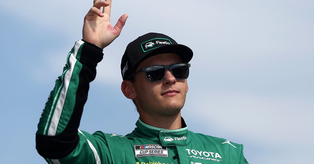 Corey Heim, driver of the Fleetio Toyota, waves to fans as he walks onstage during driver intros prior to the NASCAR Cup Series Cook Out Southern 500 at Darlington Raceway on Sept. 6, 2026, in Darlington, South Carolina.