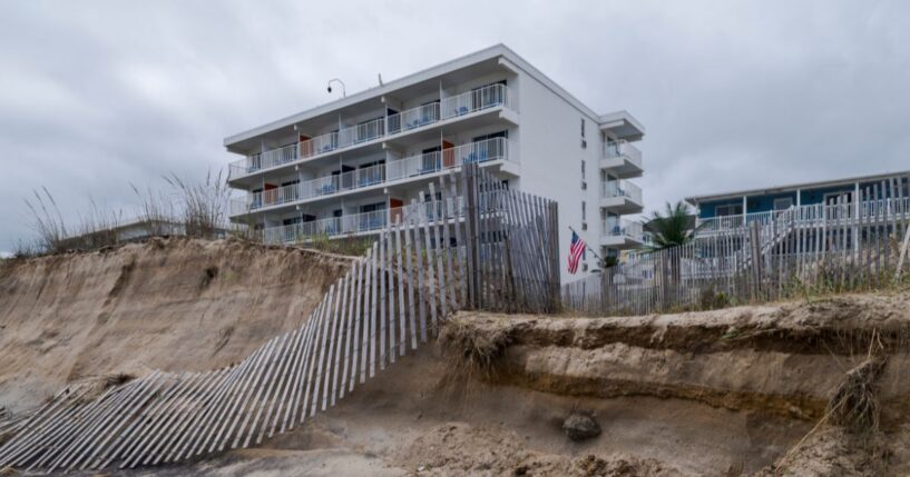 Fences and sand dunes lay in ruin along Ocean City Beach on Sept. 28, 2026, in Ocean City, Maryland.
