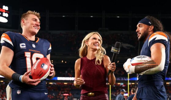 Bo Nix and Talanoa Hufanga of the Denver Broncos are interviewed after winning the game against the Los Angeles Rams at Empower Field at Mile High on Sept. 27, 2026, in Denver, Colorado.