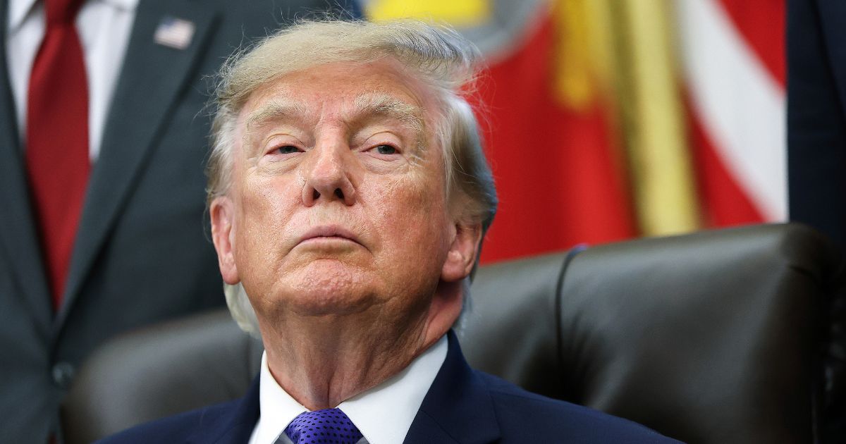 President Donald Trump listens to a reporter's question in the Oval Office at the White House on Sept. 28, 2026, in Washington, D.C.