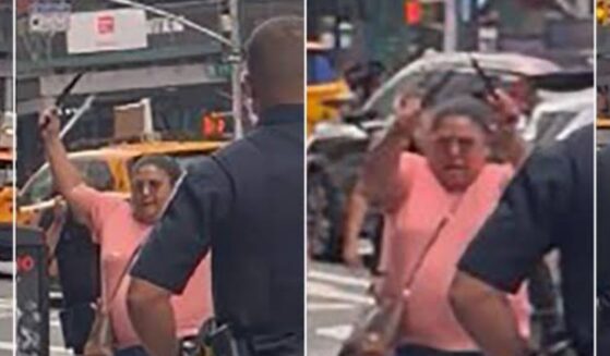 A woman in Queens, New York, stabbed two people in Times Square on Aug. 31, 2026, before police shot and killed her.