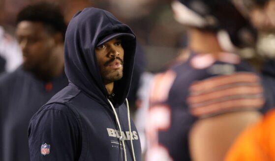 Caleb Williams #18 of the Chicago Bears looks on from the sidelines Monday during the third quarter of the game against the Philadelphia Eagles at Soldier Field in Chicago, Illinois.
