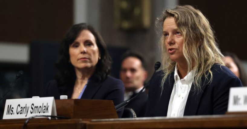Carly Smolak, right, former goalkeeper for the San Diego Spirit women’s professional soccer team, and Kim Jones, left, co-founder of the The Independent Council on Women's Sport (ICONS), testify Wednesday before the Senate Judiciary Committee in Washington, D.C.