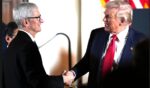 President Donald Trump greets Apple CEO Tim Cook during an October 2025 meeting in Tokyo, Japan.