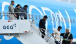 Migrants deported from the United States get off an airliner at the runway of the Juan Santamaria International Airport in Alajuela, Costa Rica, on April 11.