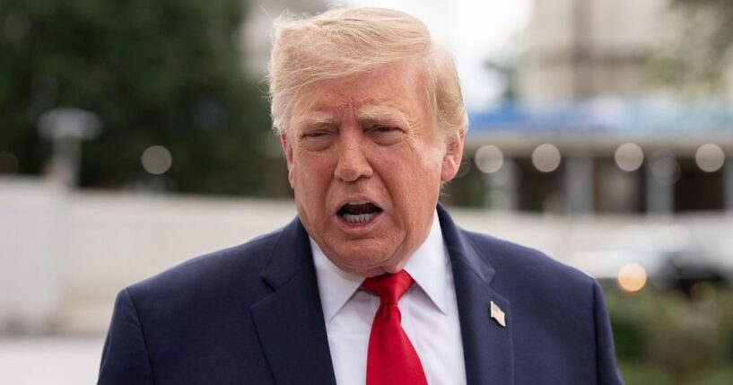 President Donald Trump, seen in a Saturday photo, called the Axios story a "hoax" and urged the political news outlet to retract it.