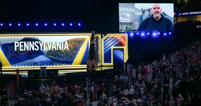 Sen. John Fetterman, a Pennsylvania Democrat, is seen on a screen as he delivers a video message Wednesday during the Republican National Midterm Convention at the American Airlines Center in Dallas, Texas.