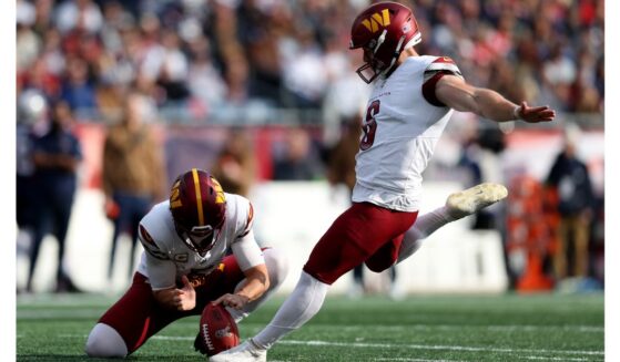 Joey Slye #6 of the Washington Commanders kicks a field goal during the first quarter in the game against the New England Patriots at Gillette Stadium on November 5, 2023, in Foxborough, Massachusetts.