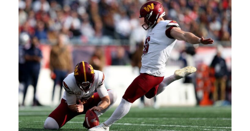 Joey Slye #6 of the Washington Commanders kicks a field goal during the first quarter in the game against the New England Patriots at Gillette Stadium on November 5, 2023, in Foxborough, Massachusetts.