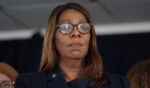 New York State AG Letitia James looks down as Governor Kathy Hochul gives a press conference on August 12, 2026.