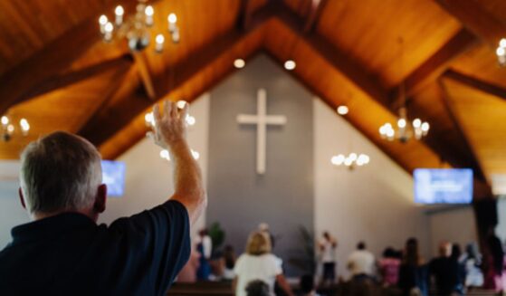 People praise the Lord in a Church.