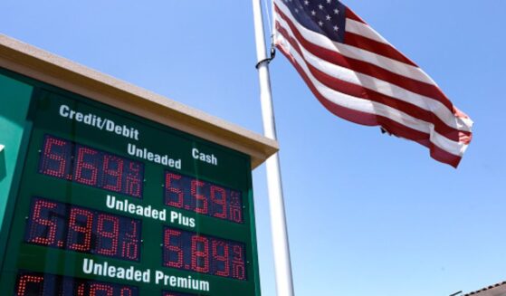 A gas meter is displayed beside an American flag on May 11, 2026 in Arcadia, California.