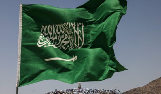 A Saudi Arabian flag flies on June 5, 2026 on Mount Arafat.