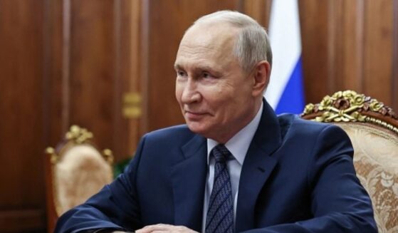Vladimir Putin, Russian President, sits in a gilded room in Moscow during a meeting with the head of the Federal Customs Service on September 21, 2026.