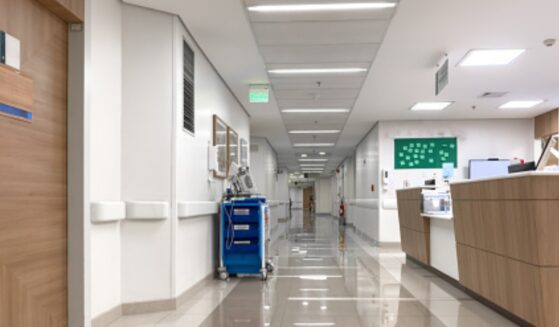 An empty hospital hallway is pictured.