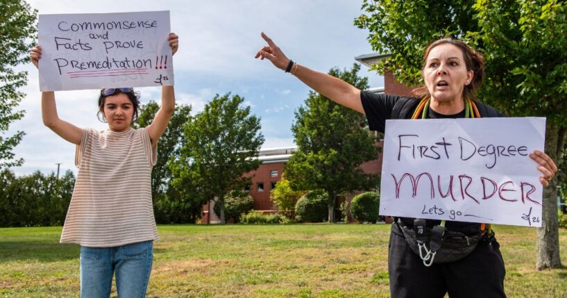 Demonstrators call for a first-degree murder verdict Tuesday as they protest outside the courthouse during the jury deliberation phase of Lindsay Clancy's murder trial at the Plymouth County Superior Court in Plymouth, Massachusetts.