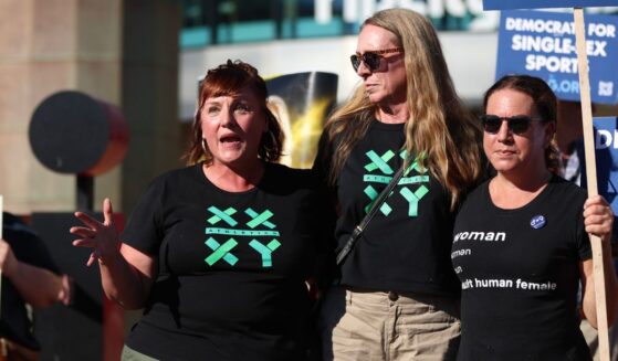 Amy Sousa speaks in front of Moda Center in Portland, Oregon, on July 31, 2026.