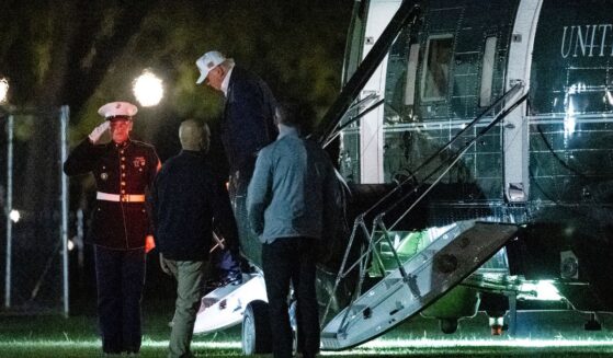 President Donald Trump exits a Marine One helicopter near the White House in Washington, DC after cutting his trip to Camp David suddenly short on Sept. 19, 2026.