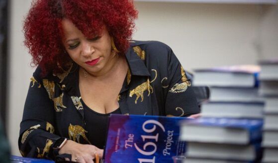 Pulitzer Prize-winning leftist journalist Nikole Hannah-Jones signs copies of her book "The 1619 Project" in Los Angeles on Nov. 30, 2021.