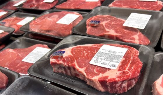 Some USDA approved beef rib eye steaks at a supermarket.