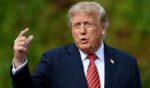 President Donald Trump, seen in a Sept. 12 photo, said the proposed deal would benefit farmers and ranchers.