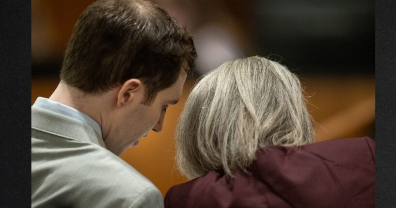 Tyler Robinson, charged in the fatal shooting of Charlie Kirk, speaks with defense attorney Staci Visser as he sits during a preliminary hearing in 4th District Court Tuesday in Provo, Utah.