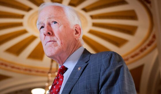 GOP Sen. John Cornyn of Texas speaks with a reporter March 23 in the U.S. Capitol in Washington, D.C.