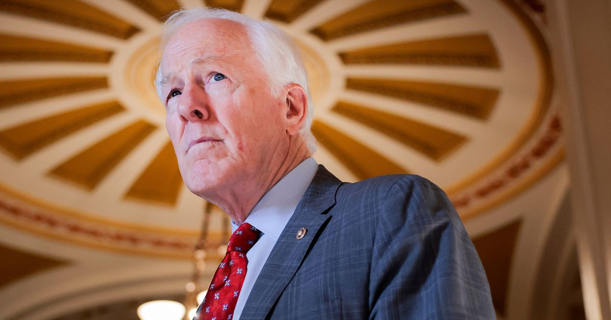 GOP Sen. John Cornyn of Texas speaks with a reporter March 23 in the U.S. Capitol in Washington, D.C.
