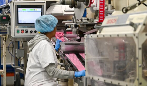 A factory worker is pictured in a 2025 file photo from The Pez Factory in Orange, Connecticut.