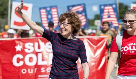 Republican Sen. Susan Collins of Maine marches in a "Moxie Day" parade July 11 in Lisbon, Maine.