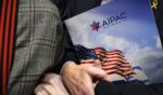 A visitor holds an AIPAC folder in an elevator on Capitol Hill in Washington, D.C. in a file photo from 2024.