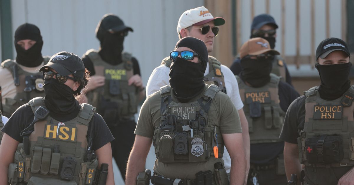 Homeland Security Investigations agents stand guard at Delaney Hall Immigration Detention Center on June 5, 2026, in Newark, New Jersey.
