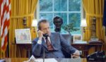 President Richard Nixon talks on the telephone at his desk in the White House's Oval Office, in Washington, D.C., on June 23, 1972.