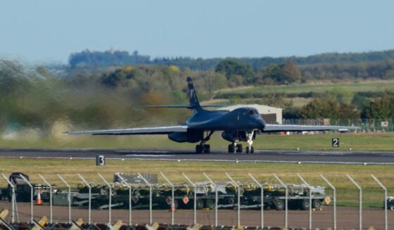 Munitions sit beside Runway 27 as a Rockwell B1 Lancer heavy bomber departs for home at RAF Fairford on Oct. 4, 2026, in Fairford, United Kingdom.