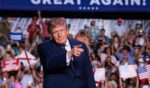 President Donald Trump arrives onstage for a campaign rally in the Mitchell Center at the University of South Alabama on Oct. 2, 2026, in Mobile, Alabama.
