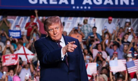 President Donald Trump arrives onstage for a campaign rally in the Mitchell Center at the University of South Alabama on Oct. 2, 2026, in Mobile, Alabama.