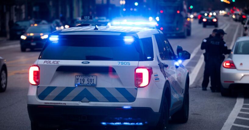Chicago Police Department officers respond to the scene of an incident on March 29, 2022.