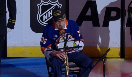 World War II veteran Dominick Critelli performs the National Anthem on the saxophone at the New York Islanders opener on Oct. 3, 2026.