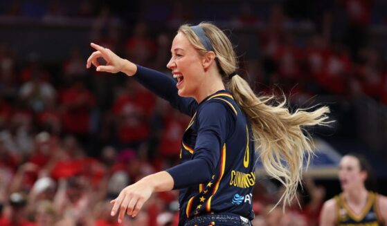 Sophie Cunningham of the Indiana Fever celebrates in the 99-89 win over the Las Vegas Aces during game two of the first round of the WNBA Playoffs at Gainbridge Fieldhouse on Sept. 29, 2026, in Indianapolis, Indiana.