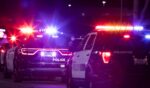Fullerton Police Department units respond to the scene of a nighttime emergency on Dec. 11, 2022.