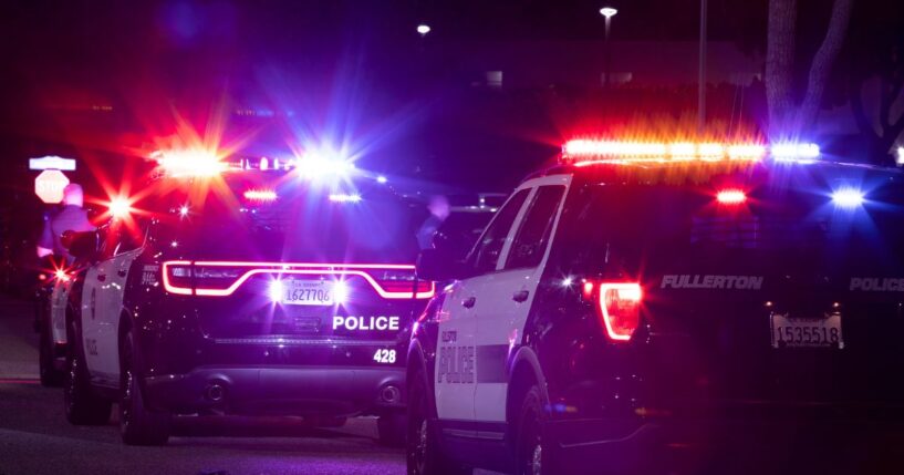 Fullerton Police Department units respond to the scene of a nighttime emergency on Dec. 11, 2022.