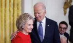 Former Secretary of State Hillary Clinton greets President Joe Biden before being awarded the Presidential Medal of Freedom in the East Room of the White House on Jan. 4, 2025, in Washington, D.C.